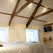 With high ceilings and comfortable bed